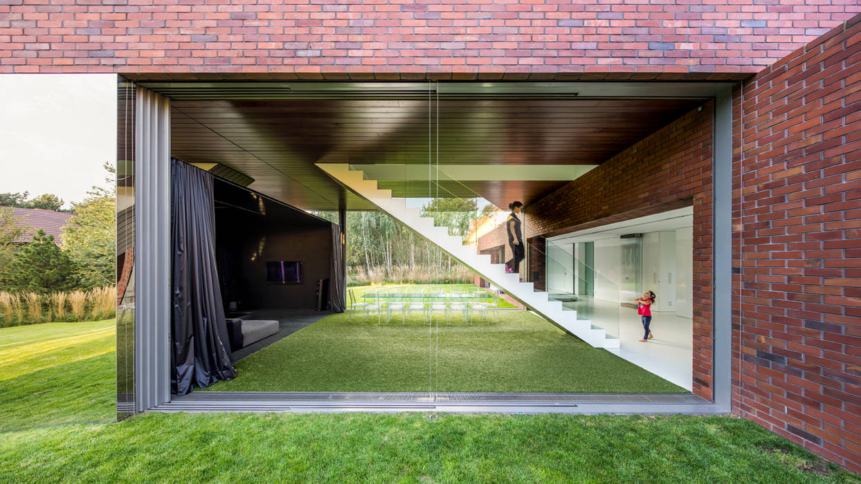 LIVING GARDEN HOUSE , KWK Promes KWK Promes Casas de estilo moderno