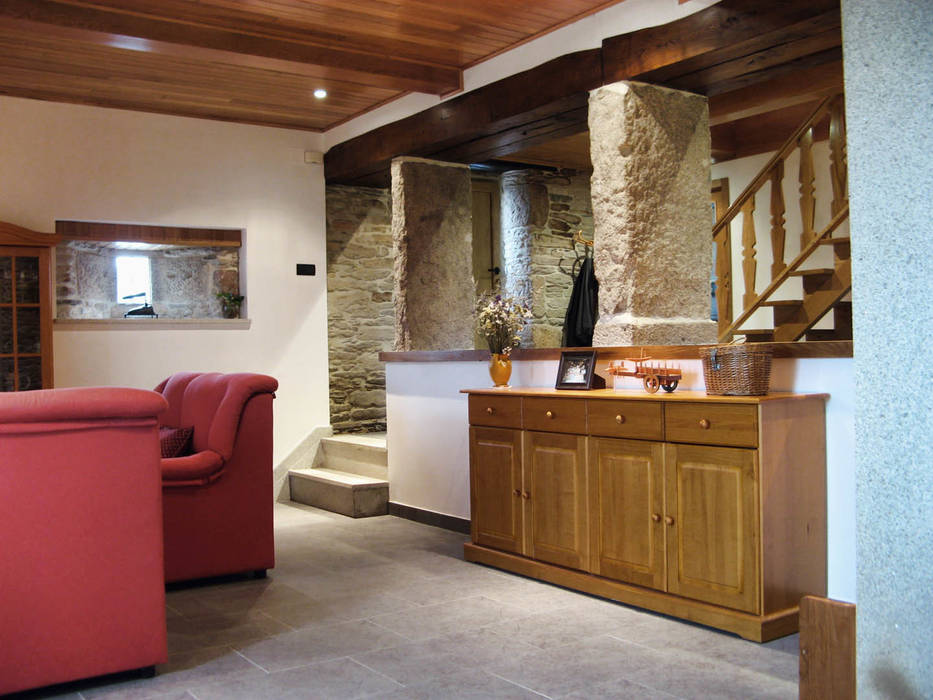 Rehabilitación en Lugo, Intra Arquitectos Intra Arquitectos Country style living room