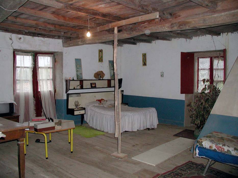 Rehabilitación en Laracha, Intra Arquitectos Intra Arquitectos Country style bedroom