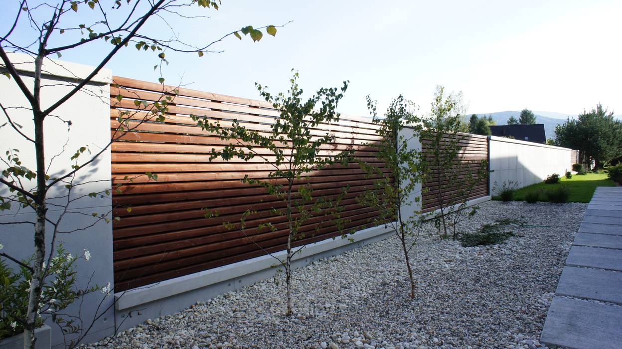 Ogrodzenie z betonu architektonicznego, Contractors Contractors Jardines de estilo moderno Madera Acabado en madera