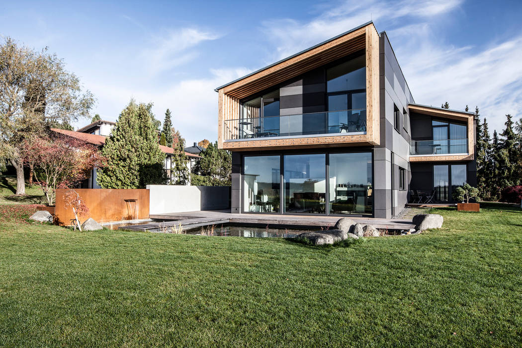 Mehrgenerationenhaus, 21-arch GmbH 21-arch GmbH Ausgefallene Häuser Wolke,Himmel,Anlage,Gebäude,Fenster,Baum,Haus,Grundstück,Hütte,Gras