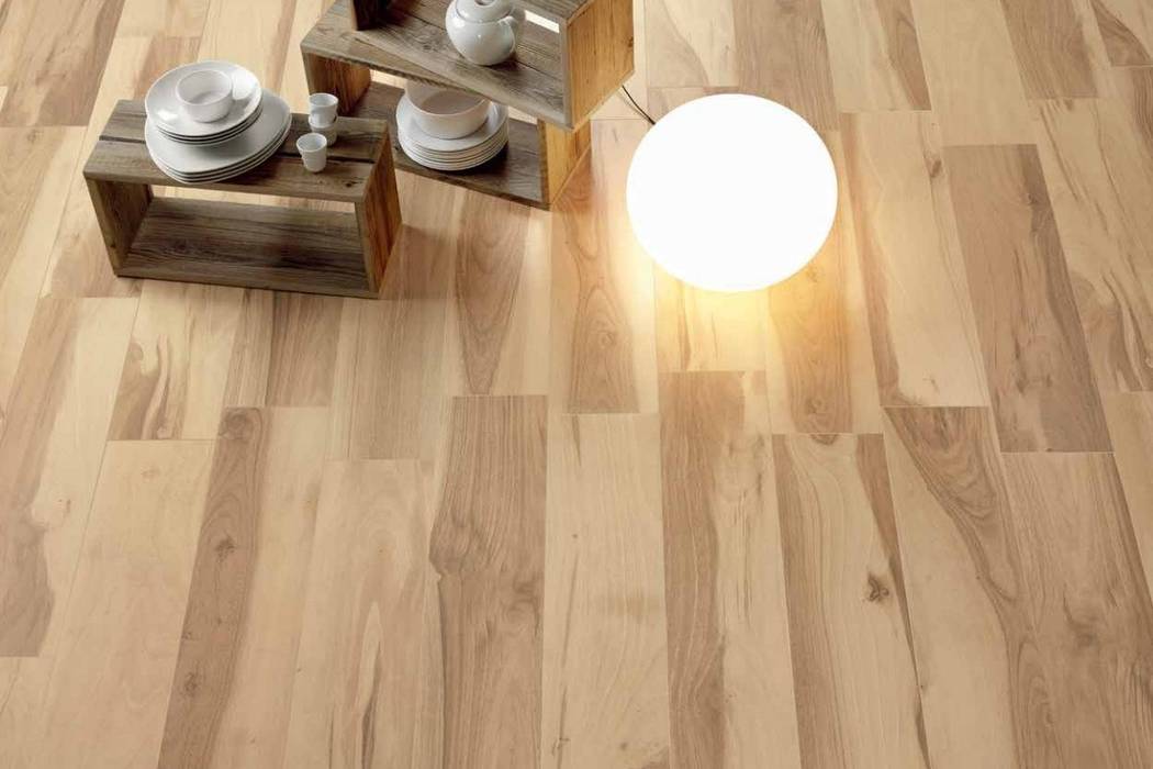 Wood effect floor tiles Acadia Biondo 22,5x90 homify Dinding & Lantai Gaya Rustic Tiles