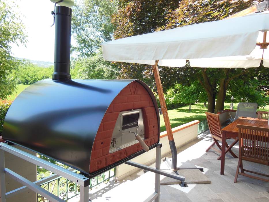 Wood burning oven Pizzone placement: Garden Genotema SRL Unipersonale Jardins rústicos Barbecues e grelhadores