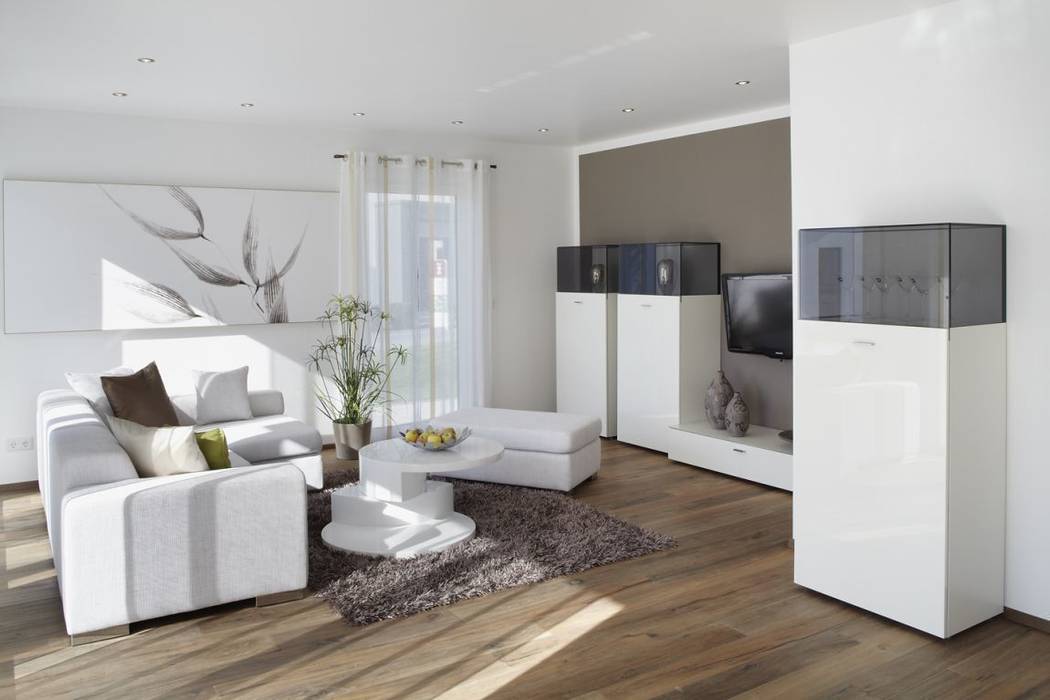 Musterhaus Avenio: Plus-Energie-Haus, RENSCH-HAUS GMBH RENSCH-HAUS GMBH Modern living room