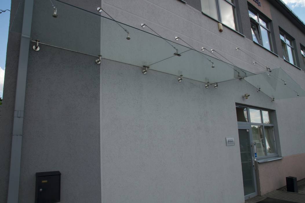 Glass Canopy with wall-suspended supports Inox City Ltd Commercial spaces Office buildings