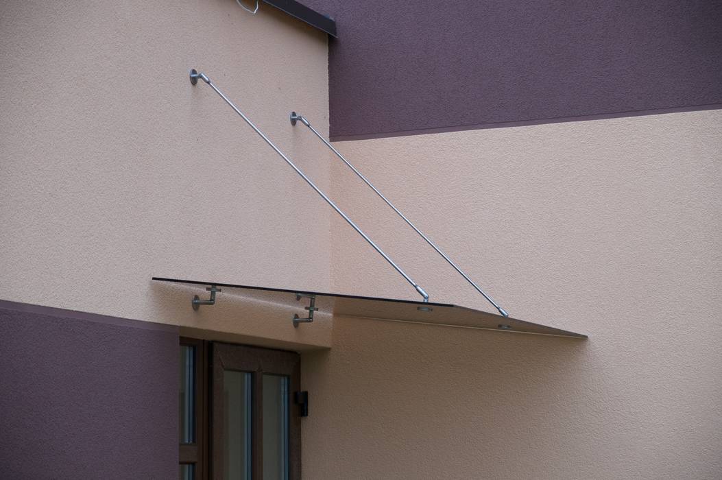 Glass Canopy with wall-suspended supports Inox City Ltd Modern balcony, veranda & terrace