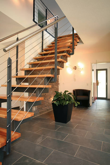 homify Mediterranean style corridor, hallway and stairs