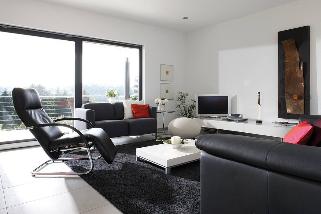 Frei geplantes Kundenhaus - Wohnzimmer homify Moderne Wohnzimmer Einfamilienhaus,Fertighaus,Wohnzimmer,Sofa,Fenster,fertighausbau,fertighäuser,holzbauweise