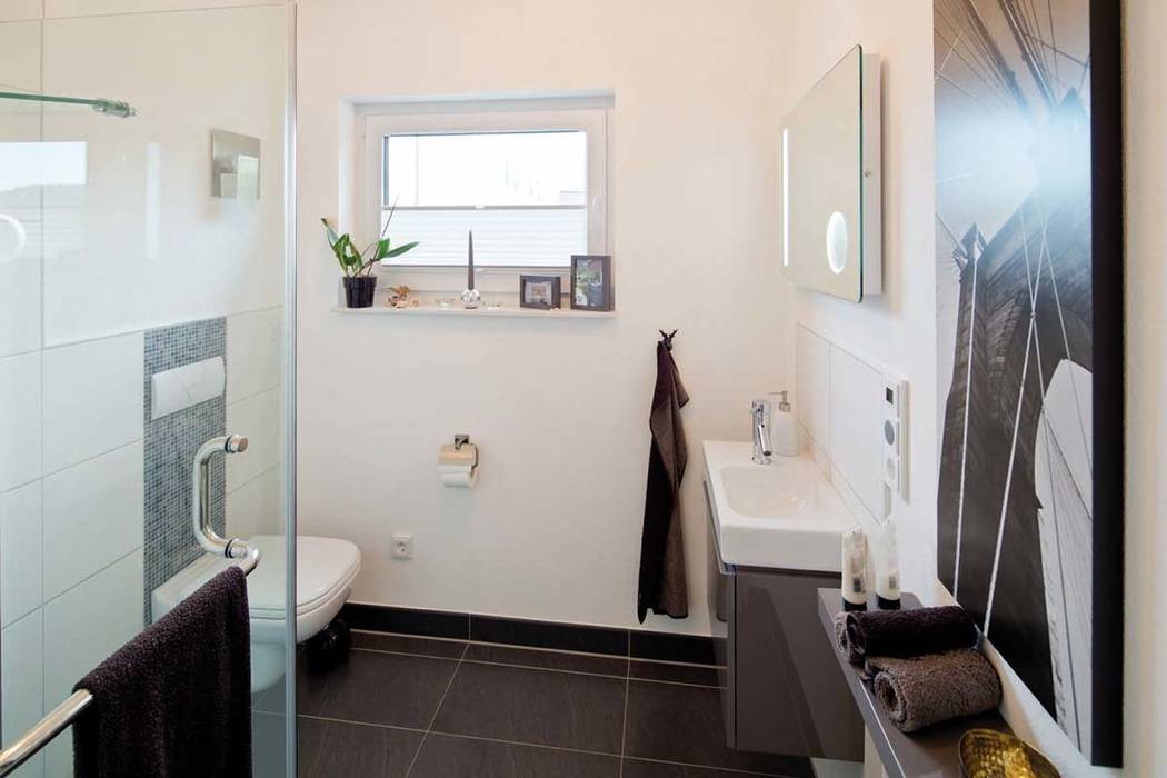 homify Modern style bathrooms