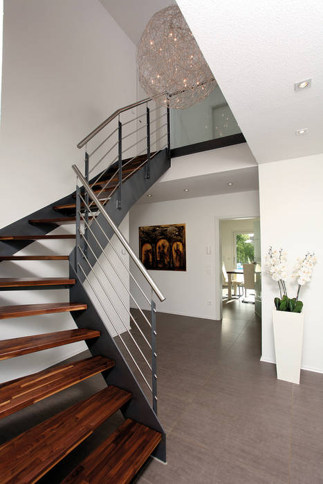 homify Modern Corridor, Hallway and Staircase