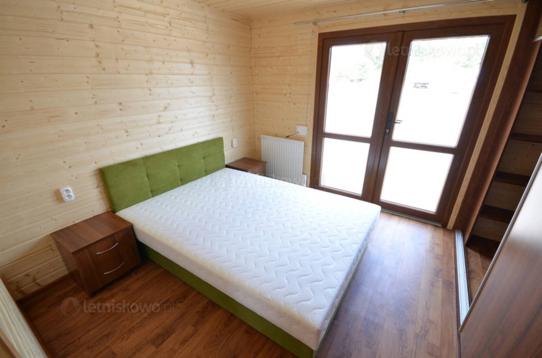 homify Dormitorios clásicos Madera Acabado en madera