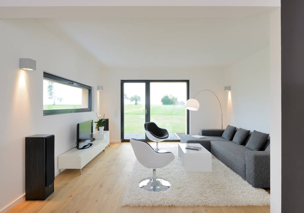 Das erste weiße Klimaschutz-Dach Deutschlands!, Bau-Fritz GmbH & Co. KG Bau-Fritz GmbH & Co. KG Modern living room