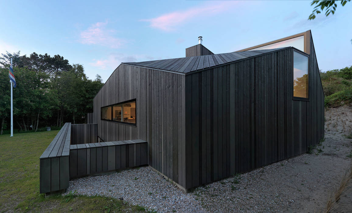 Vakantiewoning Dockboot, Schiermonnikoog, De Zwarte Hond De Zwarte Hond Landelijke huizen Lucht,Plant,Wolk,Boom,Hout,Schaduw,Gebouw,land veel,Huisje,opruimen