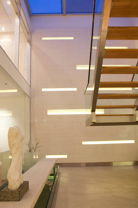 Showroom LIVE IN, LIVE IN LIVE IN Corredores, halls e escadas modernos Iluminação