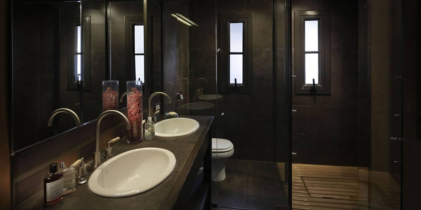 Chalet Atamisque, Bórmida & Yanzón arquitectos Bórmida & Yanzón arquitectos Rustikale Badezimmer