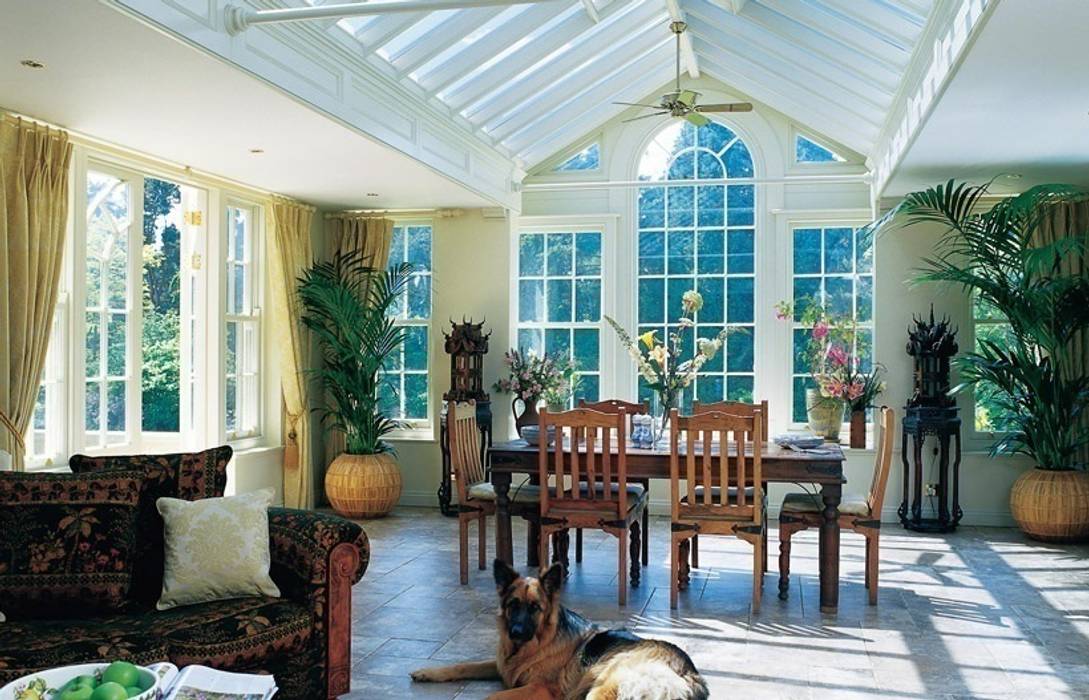 Interior of a bespoke wooden garden room in Bedfordshire Westbury Garden Rooms Classic style conservatory