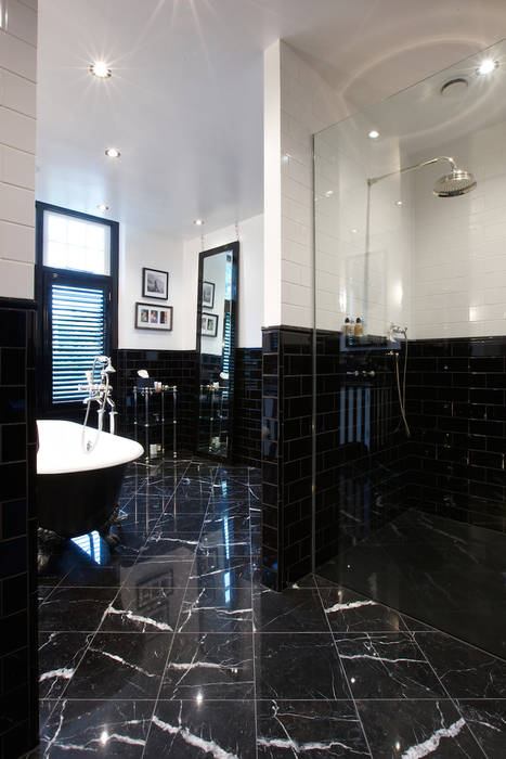 Nero Portofino Marble in a polished finish (designed by Sian Parry Jones). Artisans of Devizes Salle de bain classique