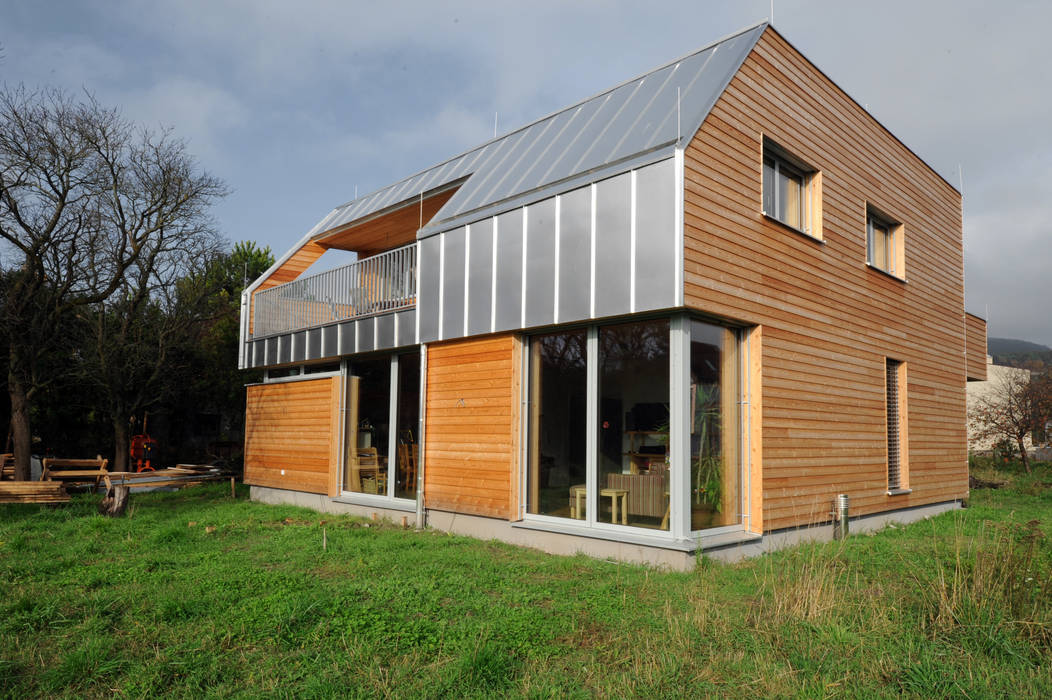 Niedrigstenergie - Einfamilienhaus in Brettstapelbauweise in Bad Vöslau (A), Symbios Architektur Symbios Architektur Modern houses Wood Wood effect