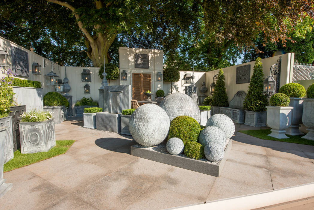 Chelsea Flower Show 2014 A Place In The Garden Ltd. Jardines de estilo rústico Iluminación