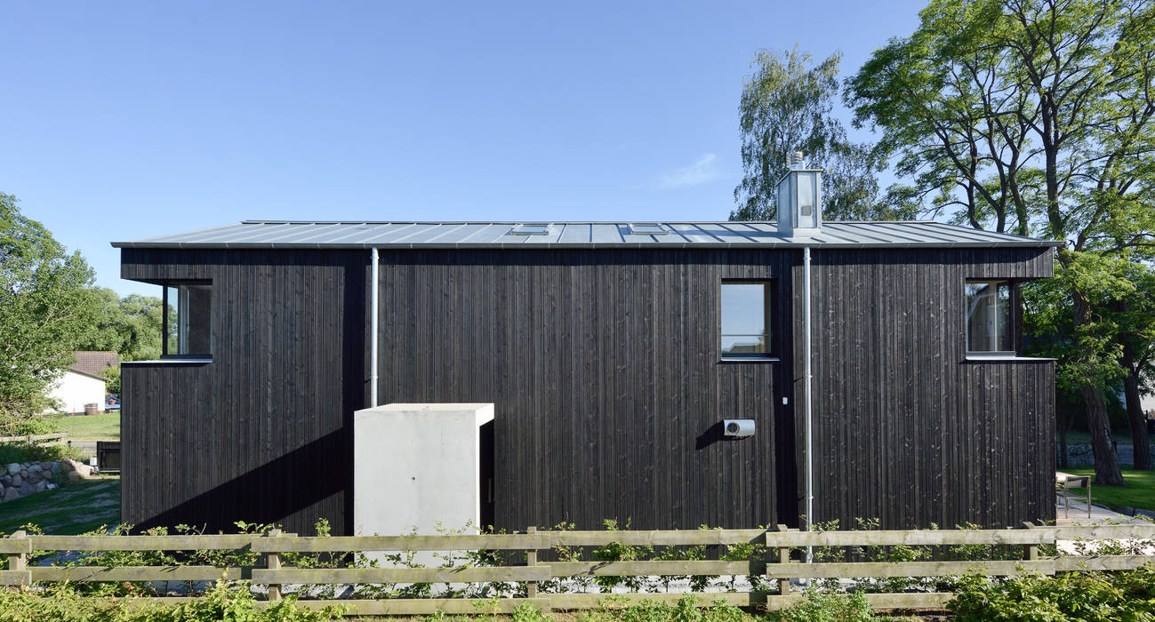 Modernes Ferienwohnhaus in Anlehnung an ein traditionelles Drempelhaus, Möhring Architekten Möhring Architekten Beşik çatı