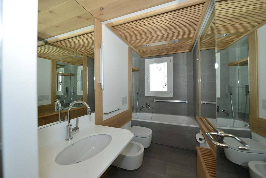 CASA DI MONTAGNA A SAINT MORITZ, VITTORIO GARATTI ARCHITETTO VITTORIO GARATTI ARCHITETTO Bagno moderno Pietra