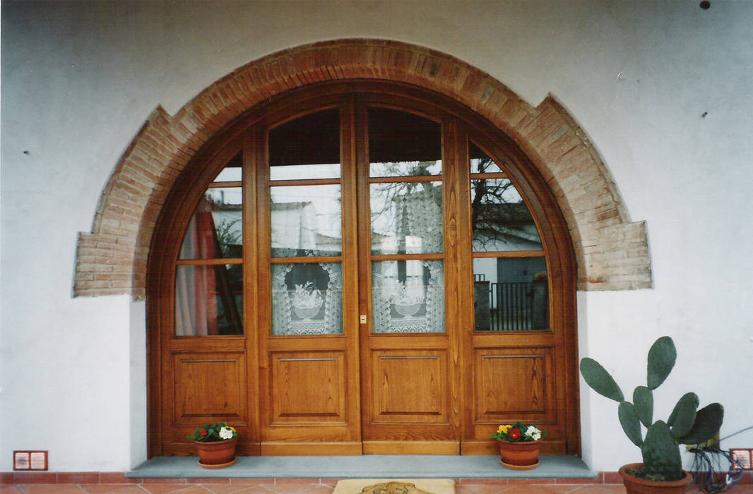 Porte di ingresso, Falegnameria Martinelli Sergio Falegnameria Martinelli Sergio أبواب خشب Wood effect أبواب