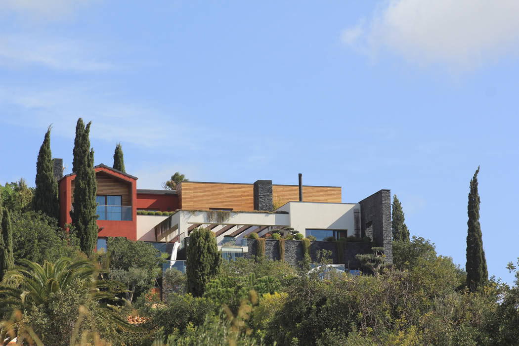 Casa Madeira, Riscos & Atitudes, Lda Riscos & Atitudes, Lda Casas modernas Madeira maciça Multicolor