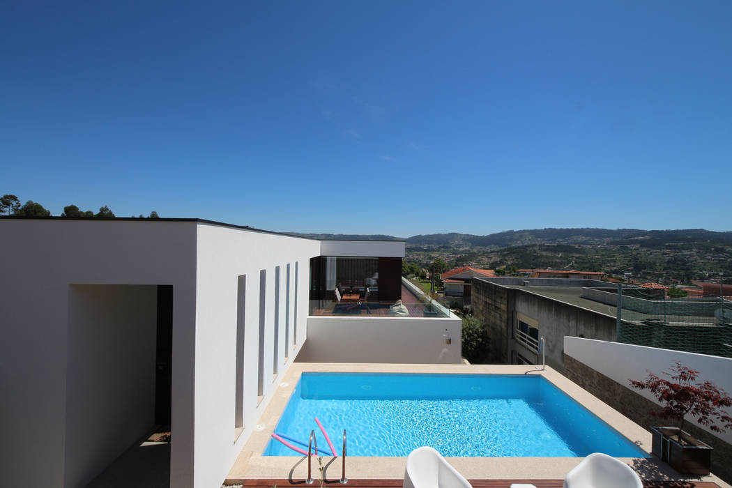 Casa em Guimarães, 3H _ Hugo Igrejas Arquitectos, Lda 3H _ Hugo Igrejas Arquitectos, Lda ミニマルな 家