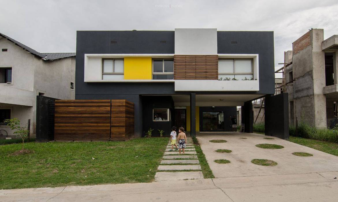 Casa Los Tipales L78, M2a Arquitectura APPaisajismo Casas modernas