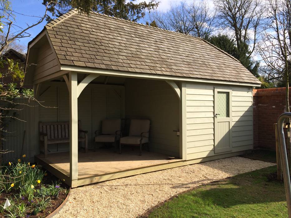 Suffolk Garden Store and Shelter homify Garajes rurales Madera Acabado en madera veranda,porch,seating,quality,cedar roof,premium,luxury,classic,barn,woodstore,entertaining