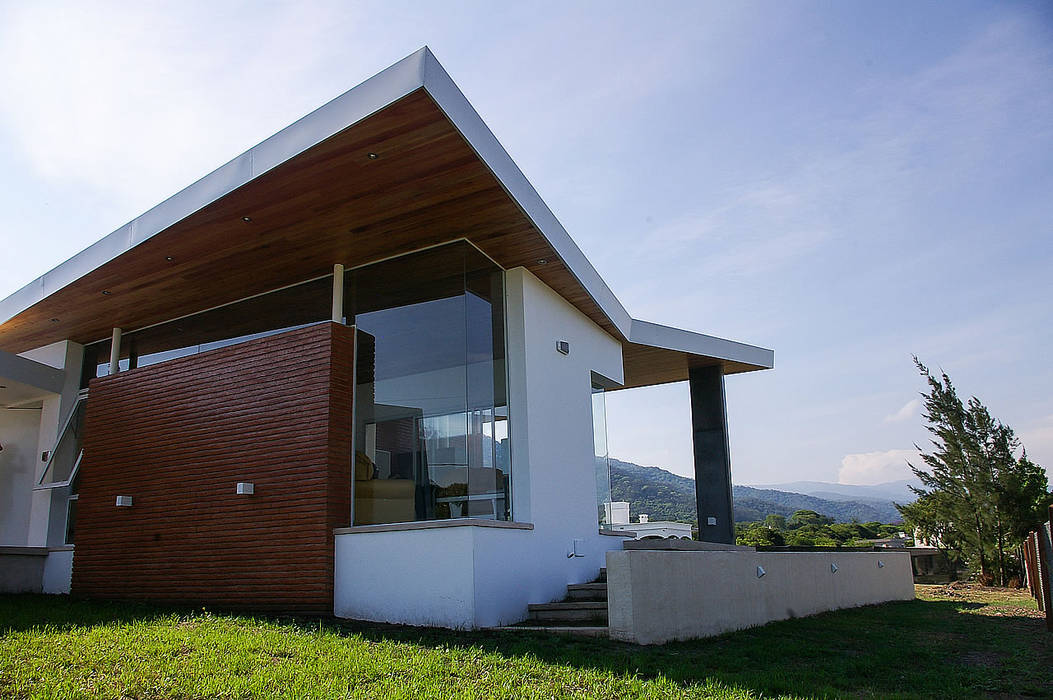 Techos que vuelan CB Design Casas modernas Ladrillos