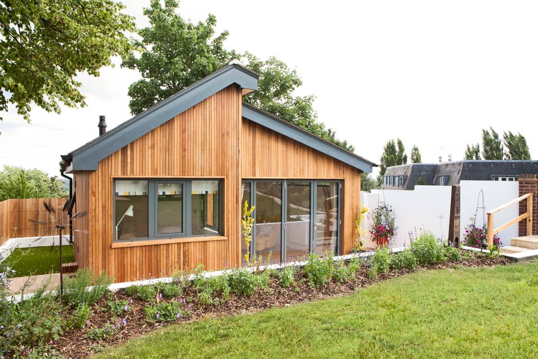 homify Modern garage/shed