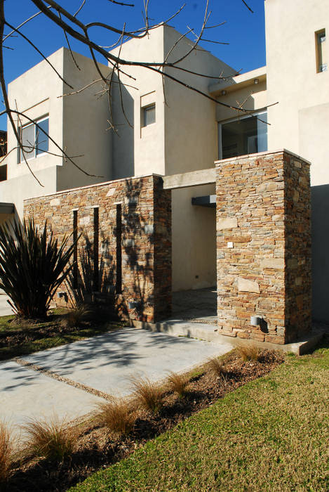 Moderna piedra y color llacay arquitectos casas modernas: ideas