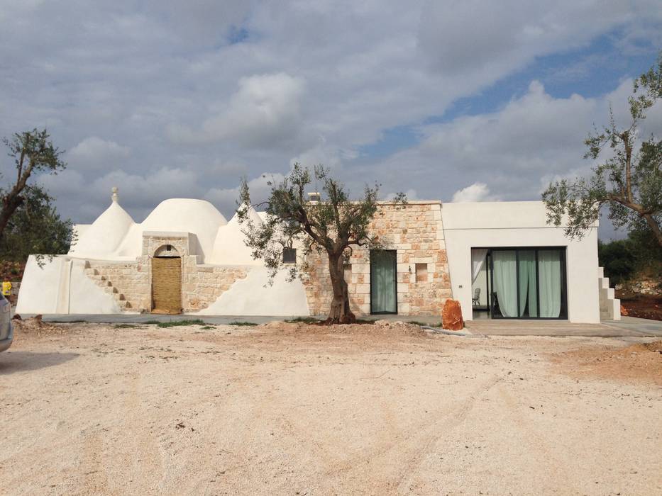 Ampliamento di un trullo, architetto Lorella Casola architetto Lorella Casola Casas mediterrâneas