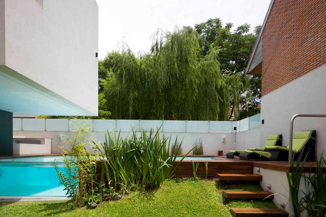 Casa Devoto: Jardines de estilo  por Remy Arquitectos,Moderno   