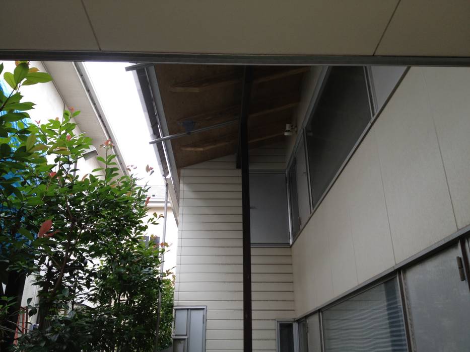 Toshio House, 伊藤邦明都市建築研究所 伊藤邦明都市建築研究所 Casas de estilo ecléctico Aglomerado