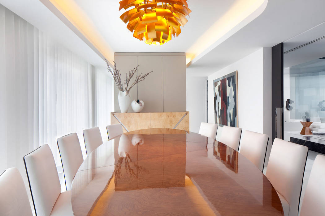 Minimalistyczna jadalnia od GAVINHO Architecture & Interiors Minimalistyczny Drewno O efekcie drewna