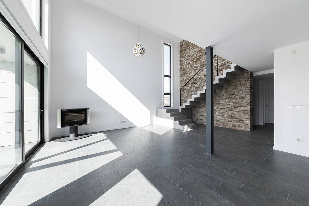 Vivienda en Mugardos, AD+ arquitectura AD+ arquitectura Moderne woonkamers Steen