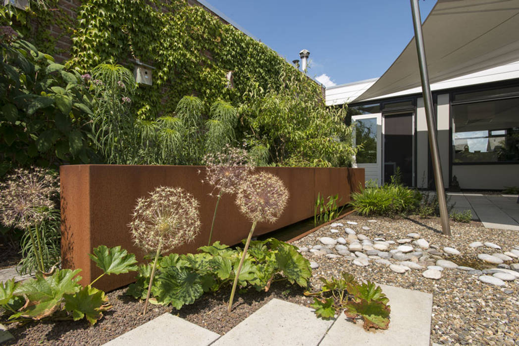 Natuurlijke kleine tuin Sleeuwijk - Tuin van het jaar 2018, De Rooy Hoveniers De Rooy Hoveniers حديقة