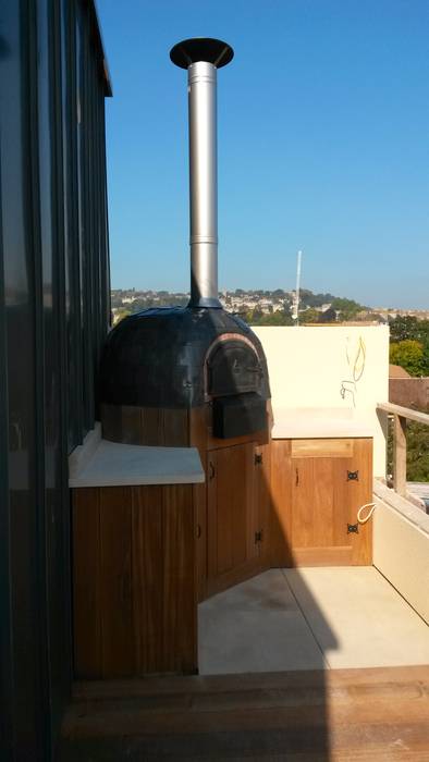 Roof terrace oven, wood-fired oven wood-fired oven Balcones y terrazas de estilo moderno