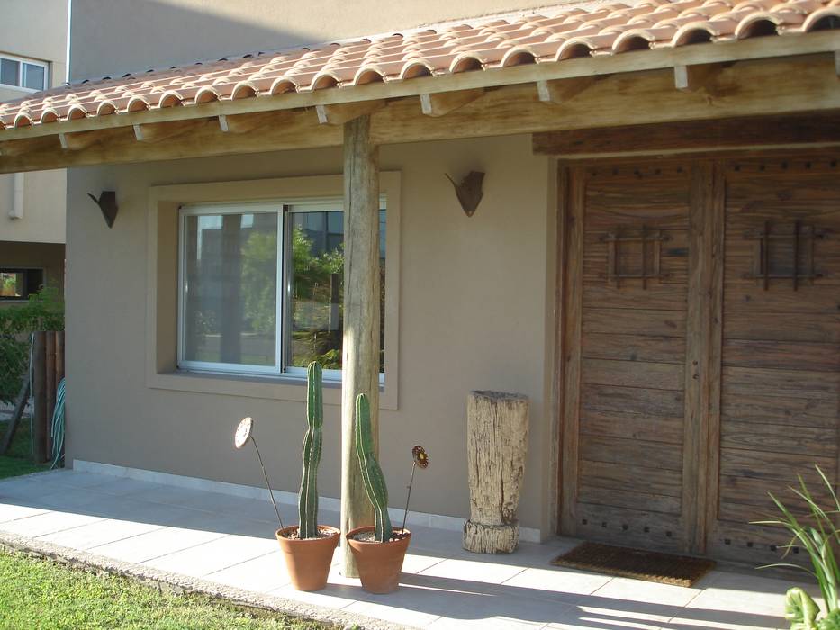 Casa en Barrio Cerrado, Fainzilber Arqts. Fainzilber Arqts. Rustic style house