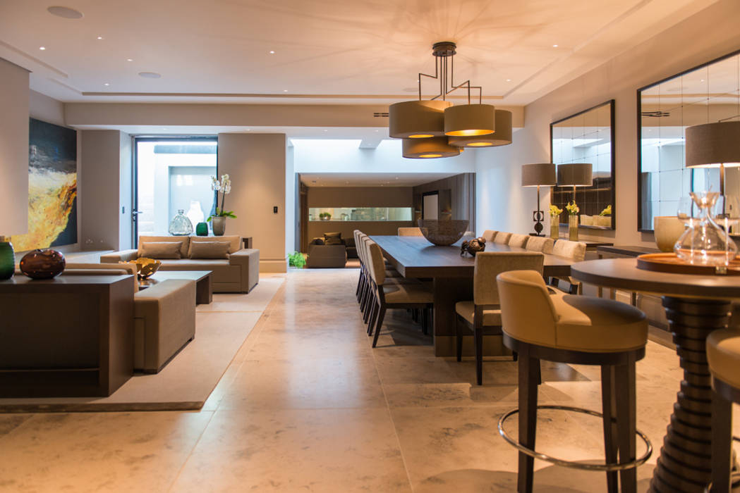 Dining Room ​and sitting area at Bedford Gardens House. Nash Baker Architects Ltd Modern dining room