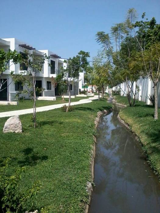 Bosques de Jiutepec, DYE-ARQUITECTURA DYE-ARQUITECTURA Casitas de jardín Piedra