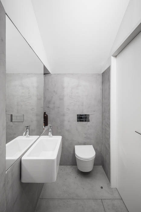 148 m2 de uma remodelação no centro do Porto, URBAstudios URBAstudios Minimalistische badkamers