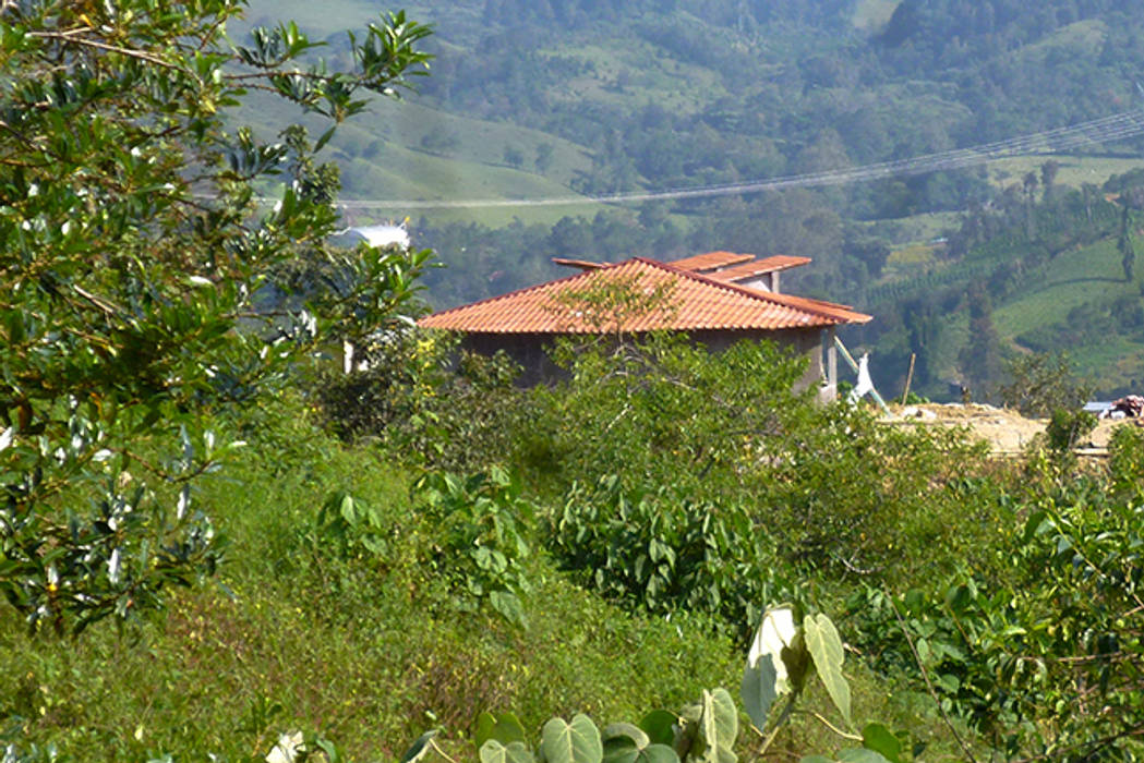 Centro de Producción de orgánicos Chilsec, Komoni Arquitectos Komoni Arquitectos Casas rústicas Piedra