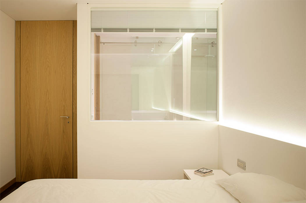 Reforma de apartamento, PAULO MARTINS ARQ&DESIGN PAULO MARTINS ARQ&DESIGN Quartos minimalistas