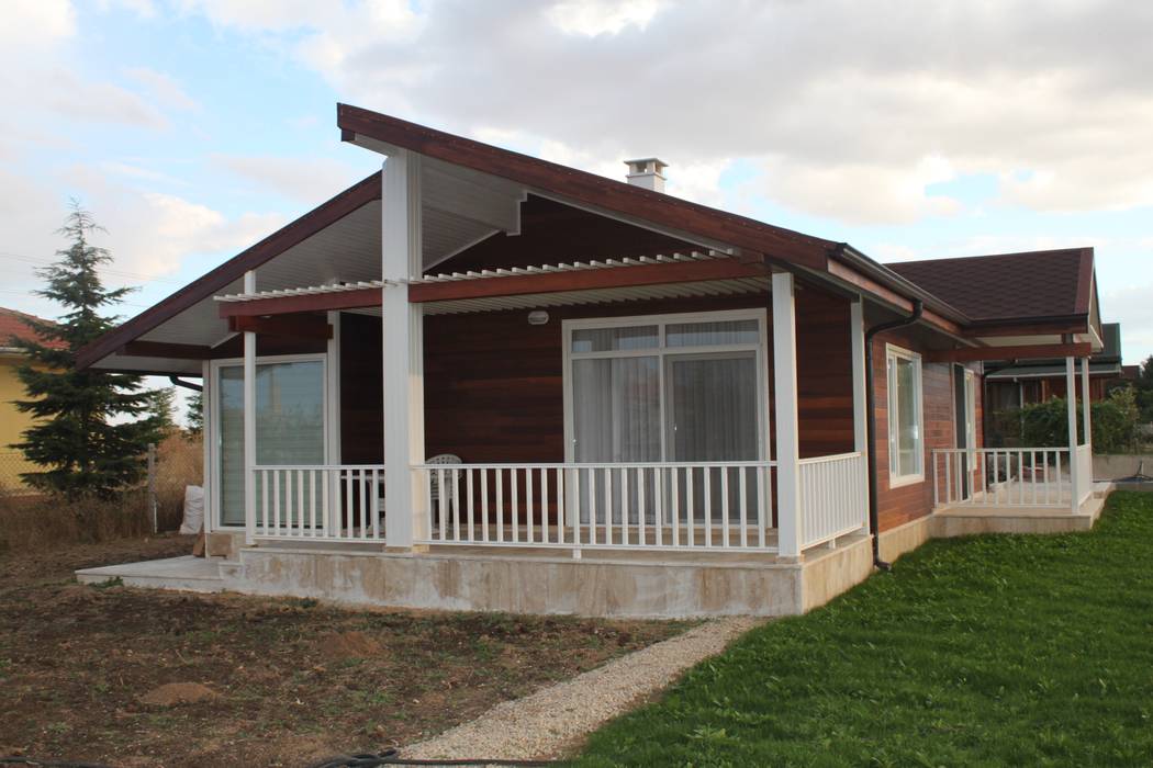 Şömineli Ahşap Ev, Kuloğlu Orman Ürünleri Kuloğlu Orman Ürünleri Casas de estilo rural