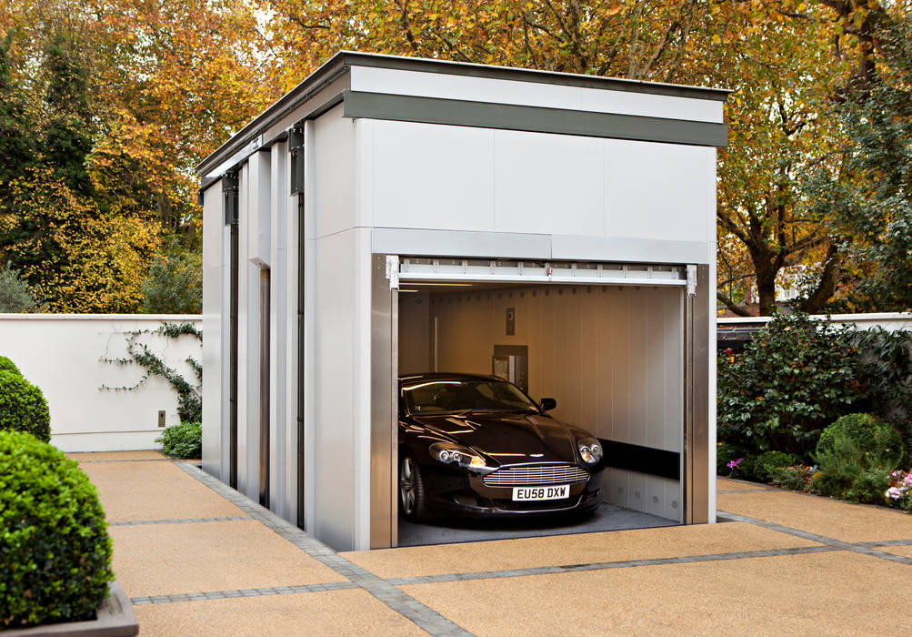 KSR Architects | Two Houses | Car lift homify Garagens e edículas clássicas