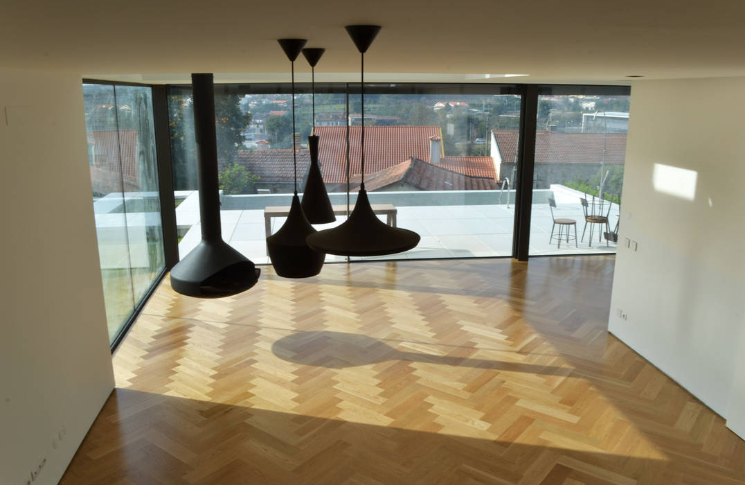 Sala de estar homify Salas de estar modernas Madeira Acabamento em madeira