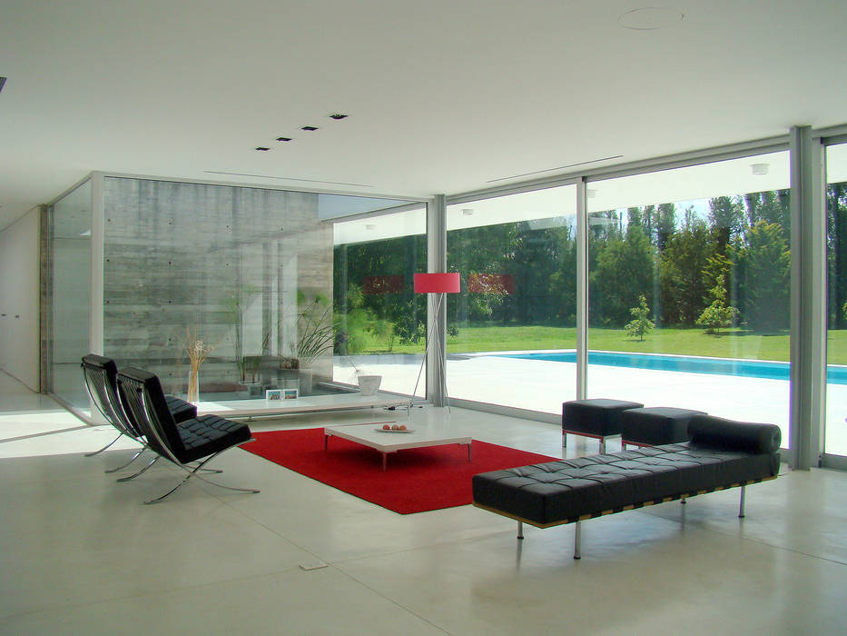 CASA EN OPEN DOOR, MENEGHETTI ARQUITECTOS MENEGHETTI ARQUITECTOS Modern living room